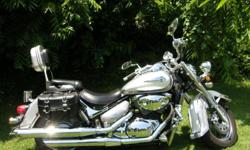 2003, Suzuki, Volusia Intruder-VL800 Cruiser, with only 11,365 highway miles.&nbsp; Pearl and Silver with chrome accents.&nbsp; In execellent, like new condition with the following add on extras; saddle bags, backrest, motor bar, foot pegs and tri-head