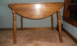 Like new, table measures 24" X 36" with leafs down.&nbsp; 36" diameter with leafs up.&nbsp; Seats two with leafs down and four with leafs up.&nbsp; 29" high.&nbsp; Located in Manheim.&nbsp;