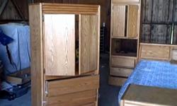 This is a oakwood full King size bedroom set, It has plenty of storage on both sides of bed and underneath the mattress. i have it stored in a shop now and have no use for it now. I had it custom made for me and hate to get rid of it !