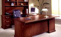 U-Shaped cherrywood office desk with credenza in excellent condition for sale.&nbsp; $800 or best offer.&nbsp; I have a left and a right.&nbsp; They are both in excellent condition.&nbsp; We had custom glass toppping made for each of the desk.&nbsp; If