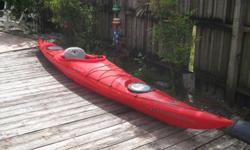 Mint condition. Used only three times. Good for larger kayakers. Red polystyrene. Cockpit cover included.