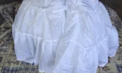 Petticoat undergarment to be worn under a skirt or a dress to give it that full look.