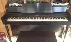 Ebony Wurlizter upright beautiful sound piano, with stool.
&nbsp;