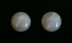 The pictures do not show the pink very well, the earrings actually look as if there are white clouds traveling through a pink sky.
The earrings measure about one inch in size.
Also, we have a pair of faux pearl earrings
&nbsp;