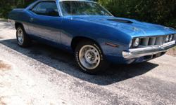 1971 Cuda 340, 4 barrel carb and 727 auto trans. This is a true american classic and only about 1615 of these were made in 1971. This Baracuda looks and runs great. It has always been well takan care of and loved, garage kept most of its life. The engine