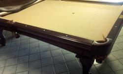 Beautiful Olhausen pool table..Cherry wood.. ...Accu-Fast rails...cover and accessories included. EXCELLENT condition...rarely used. Moving MUST SELL. $1500.00 OBO. 216-299-9042