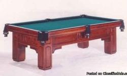 Professional pool table. Gandy Georgian regulation pool table with cues, balls, racks, and more. This table is in excellent condition made of solid maple and is inlaid with abalone and mother of pearl. The 1 inch matched italian slates have no cracks, or