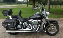 2006 Harley Davidson Heritage Softail Classic $8,000 OBO. Blue Book Value for BASIC model: $7,800 but this bike has thousands of dollars in aftermarket upgrades. Mileage, as of 09/24/2014: 65,685 miles. One owner, No Trades, Serious inquiries only. Sold