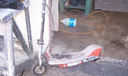E200 orange and silver scooter. Good condition, with two batteries. Accepting all reasonable offers.