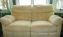 In almost new condition.....butter yellow love seat.....has 2 recliners.....great condition !!!!!!
call....(225)3465222
