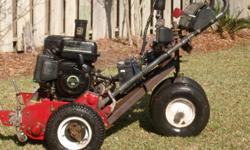 Toro 1000 greens mower - remote steering- One of a Kind- you can not imagine the response
your neighbors will have when they see it. It was to fast to walk behind - so I set up a remote steering system that allows you to drive the unit up to 100 yeads
