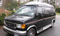 Beautiful, mint, black Ford conversion van. under 15k miles!!! Better than new...save a bundle. Leather, fully carpeted, TV, DVD, CD, 4 captains chairs, fold-down rear seat (I've slept on it many times, very comfy!) tilt-out windows, retractable blinds.