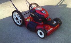 6 yr old Sears craftsman walk behind mulcher lawn mower. Self-propelled front gear drive, 6.2 horsepower with a 22 inch cut. New blade. All tuned up and ready to go. Excellent condition