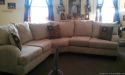 Cream coler new with three pillow and foot stool