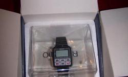its a rc-1000 seiko computer watch that was made in the early eighties. Its a collecters item. It is black with a black band. it comes with a cable to connect to your computer. Still in box and has never been worn.just put a new battery in it.it works .it