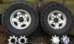 I have a set of 4 Aluminum rims that came off a 4x4&nbsp;Ford F250.&nbsp; Rims are in good shape and have the center caps and lugnuts.&nbsp; They have Toyo Mudgrips mounted on them 305/70 16. Tires are about done but do hold air and can be used for a