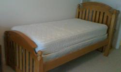Solid wood single bed excelent for the growing child to adult hood. American made very strong solid and hardly used. No damage found. Mattress and Box Spring included. Just pick it up and its all yours.