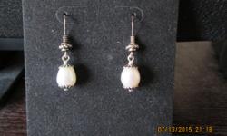 Fresh water tear drop geniune pearl sterling silver earrings selling 8am - 6pm no shipping cash only.