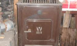 in good condition, antique wood/coal stove