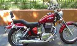 650cc, windshield, new handgrips,new mirrors, new tires, backrest, 2100 miles, runs excellent.