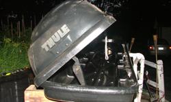 Item for sale is a used Thule "Frontier" Roof-Top Luggage Carrier. It is in very good condition with the exception the lock is missing; it was that way when I bought it from an aquaintance. It is roughly 7-feet long and was used for skis and other