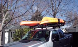 Thule Hullavator rack system - Complete Hullavator 897XT set up for two kayaks - Hullavator system new over $1600 - sell for $700 - like new used 4 trips () -.
Note: kayaks in photo are for illustration purposes only. They have been sold.