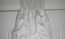 I have available for purchase a cute all white toddler gown. This dress was worn only once for a few hours. It has been dry cleaned and has been stored in a non smoking household. The dress is a toddler size 3/4 and is floor length. If interested this
