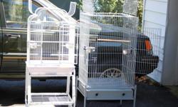 Two bird cages for sale. I am downsizing and need to sell these two. Both are cleand and come with stainless cups
and a perch or two.
Gray one is an older cage but in great condition. It is 24x24 and 53 inches tall from the floor. $70.00
White one is a