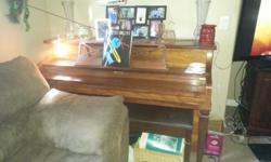 I have an upright grand piano that is in really good shape and that is tuned.&nbsp; The only reason we are selling it is that we are trying to pay medical bills.&nbsp; Make me a reasonable offer and it is yours.