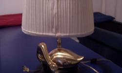 cleaning out the basement and came across this old duck lamp in very good condition, asking 25 dollars for it.