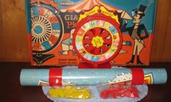 For sale is a Remco Giant Wheel Picture Bingo Game.
*Brand: Remco
*Model: 801
*Year: 1950?s
INCLUDED:
*Spinning Picture Wheel
*Wheel Base
*34 Red Bingo Stars
*40 Yellow Bingo Stars
*Game Mat
*Instuction Sheet
*Final Inspection Slip
*Original Box
DETAILED
