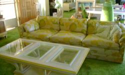 Couch with leaf patterns in pale greens, yellows & golds. Great condition too. Also 2 matching yellow chairs, marble table, and coffee table with glass top & colors of cream & yellow. Excellent shape! Style is French Provencial. Furniture in Anaheim.