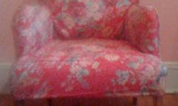 Very nice and comfortable &nbsp;arm chair,not too big or massive; wood legs and framing. Upholstered with white fabric - needs cleaning. Comes with red flower-pattern slip cover.&nbsp; Price: $125.00 Pick up at doorman building with elevator.