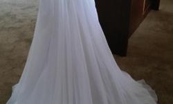 Strapless, chiffon with side drape, extra long length, beautiful beading. In Excellent condition. White. Its on Dave's bridal website style #v9409.