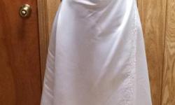 Wedding dress has been worn. Could be worn with or without straps. No train. Original price was $400.