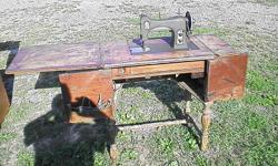 very old electric sewing machine
patented Oct. 25th, 1927
65 watts/ 110 volts
In very good condition/sewing machine cabinet
fancy antique leg design