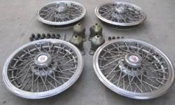 I have a set of 14 inch wire hub caps I took off of my 1981 monte carlo, It is a full set of four it has all the mounts all of the lug nuts all of the lock bolts and the wrench to remove them with. They are just a little dirty but no rust at all. They