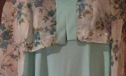 Size 12 1/2 Beautiful Aqua (Floral Bodice) with removable Floral print Jacket.&nbsp; Would be great for Mother of the Bride or Groom.
Worn only a few times.