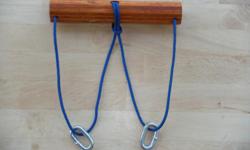Can you get one of the rings onto the loop of string with the other ring? No tools, cutting, breaking, smashing, or prying required.
3.5 feet of 1/4 inch light purple rope. (8) inches of 1 1/4 inch wood octagon. (2) 1 1/2 inch steel chain links. Hand made