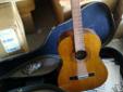 Acoustic Guitar and solid guitar case